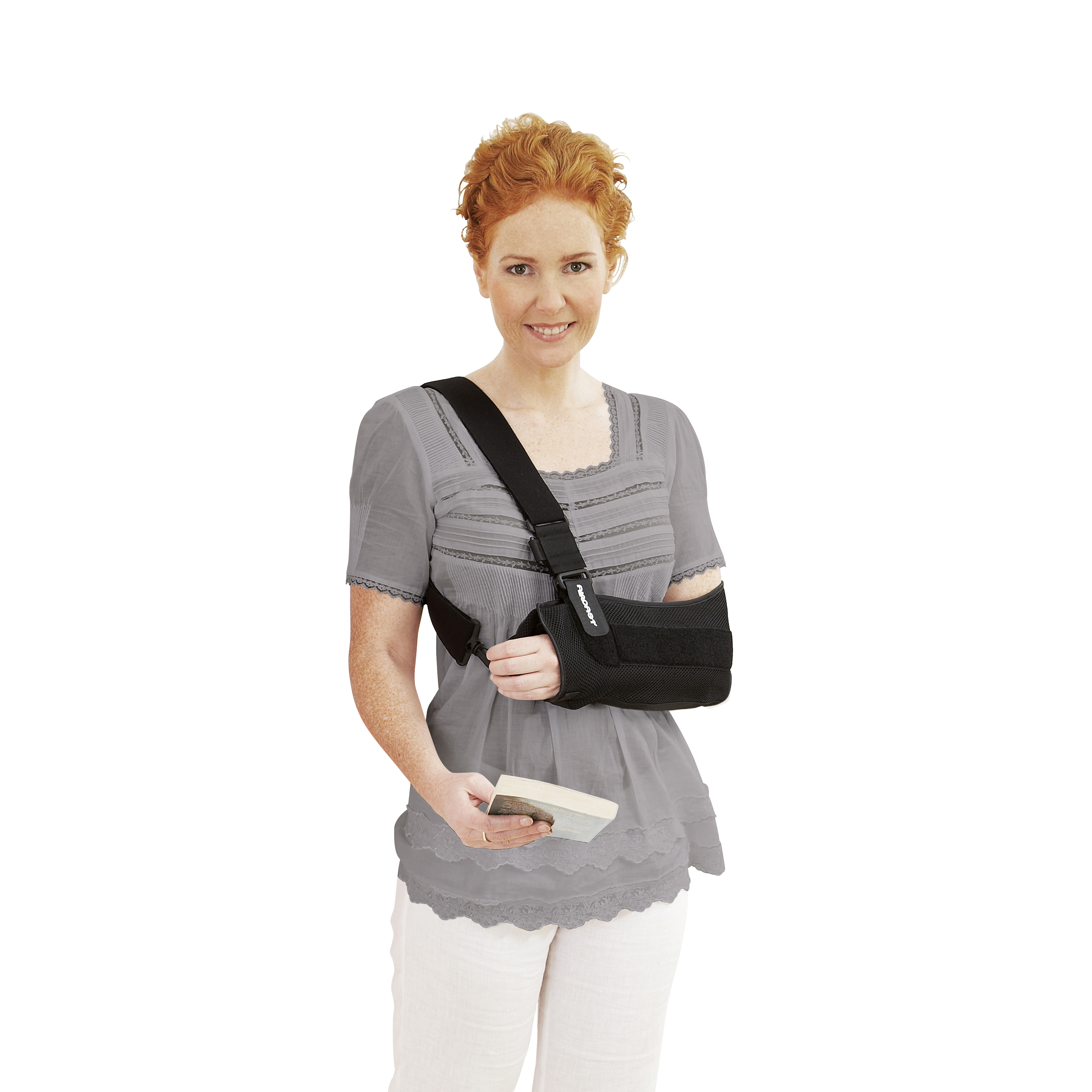 Produktbild AIRCAST® Arm Immobilizer, Schultergelenkorthese zur Immobilisierung Frau mit grauem Oberteil und Buch